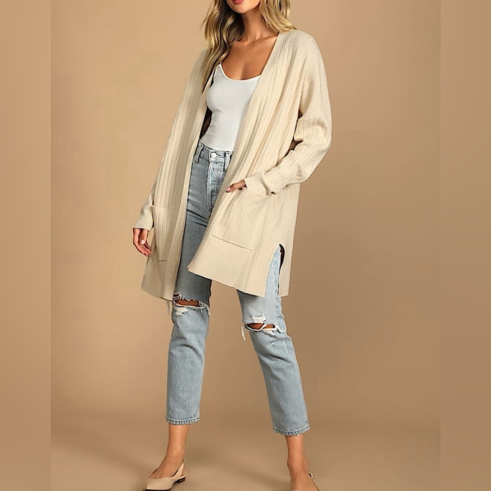 A cream colored mid length cardigan!